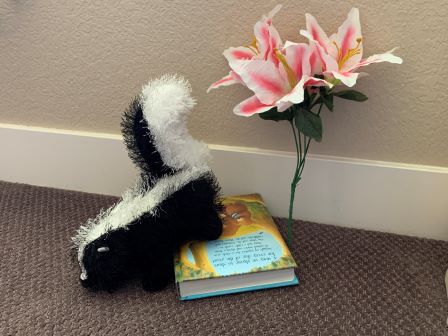 Oliver spraying a flower!